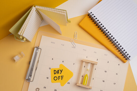 Day off - workplace message in the office. Concept of absence from work and day off