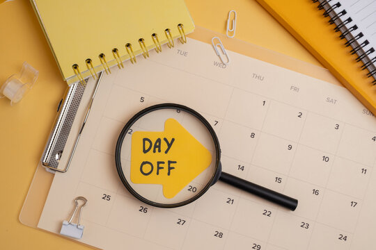 Day off - workplace message in the office. Concept of absence from work and day off