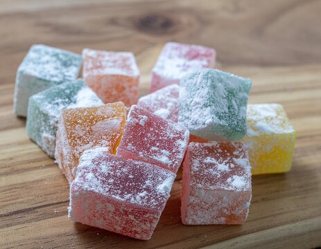 Colorful turkish delight lokum sweets, bright pastel colours.