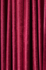 Red velvet stage curtain vertical background.