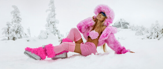 Glamour Winter Fashion Woman in Fluffy Pink Fur Outfit and Boots, Glamorous Snow Style Editorial...