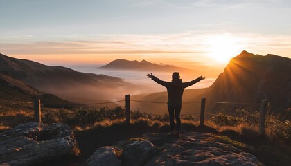Freedom and Awe: A Traveler Spreading Their Arms to Embrace Breathtaking Mountain Landscapes at Sunrise