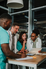Medical professionals collaborating during hospital team meeting