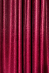 Red velvet stage curtain vertical background.