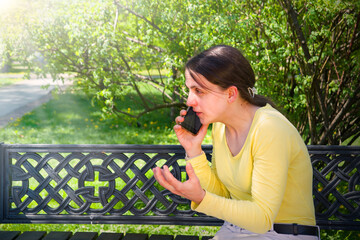Young girl speaking by phone