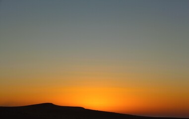 A desert sunset, which many dream of but few experience. These sunsets have stories which takes one into a different dimension with the fire lit and a loved one with you to share your thoughts.