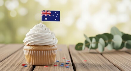 Delicious cupcake adorned with an Australian flag on a rustic wooden table for national identity concept and Australia Day celebration