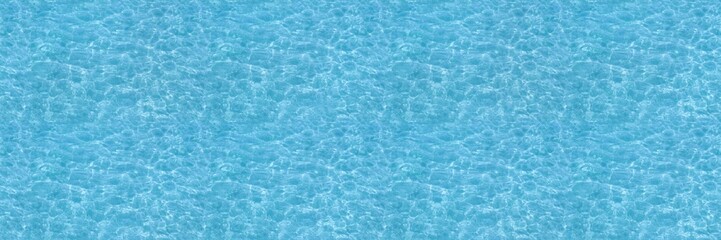 Water ripple seamless background texture - top view of clean, clear, blue water ripples. Image can be tiled to create a larger image or higher resolution background. Water has the chemical formula H2O