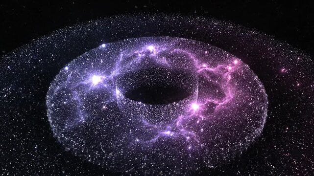 Abstract glowing torus with sparkling particles on black background