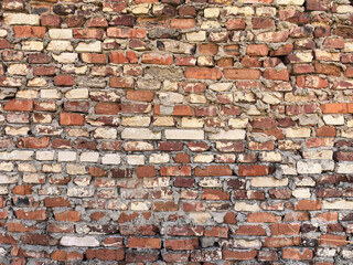 Unique patterned brick wall showcasing earthy tones and textures