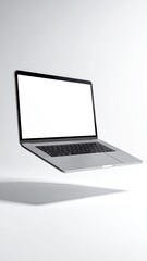 Floating laptop with blank screen, shadow cast on a white background