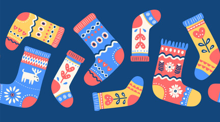 Cozy Scandinavian Winter Seamless Pattern, Nordic Folk Vector Illustration. Colorful Knitted Holiday border Repeat Pattern, Hygge Winter Design. Cute Christmas Socks on Festive Blue Background