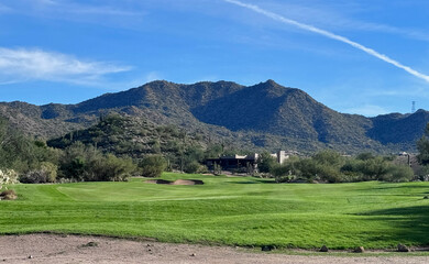 A golf course located in the southwest United States during the winter.