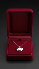 Elegant silver Claddagh pendant necklace displayed in a luxurious open red velvet jewelry gift box