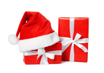 Santa hat and gift boxes isolated on white. Merry Christmas and Happy New Year
