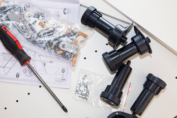 Closeup view of hardware assembly set in workshop environment, Detailed image showcasing electronics parts and tools arranged on workspace with natural lighting