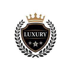 Elegant luxury shield emblem radiating prestige and timeless design with golden crown and laurel