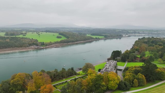 Autumn over Plas Newydd House from a drone, Gardens and Parkland, Llanfairpwllgwyngyll, Anglesey, Wales, UK