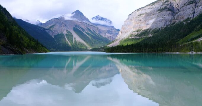 Spectacular drone footage of turquoise Kinney Lake with Mount Robson rising dramatically in the background. Captures the beauty of the Canadian Rockies and one of the region&rsquo;s most scenic hiking route