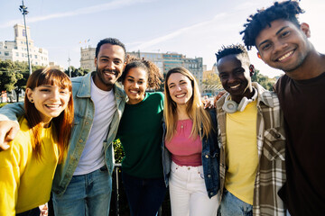 United multiracial young group of college students standing together outdoor. Friendship concept