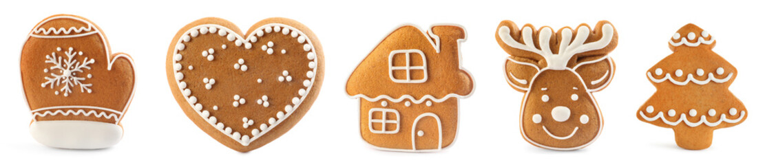 Christmas gingerbread cookies decorated with icing isolated on white, set