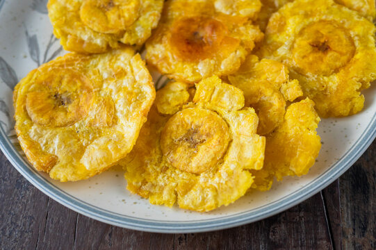 Delicious patacones, fried plantain slices, on a plate