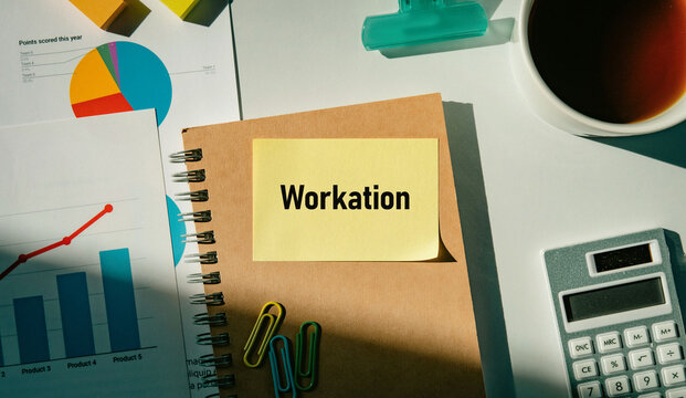 There is sticky note with the word Workation. It is as an eye-catching image.