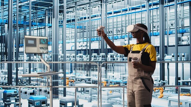 Smart photovoltaics factory expert wearing VR headset looks at system performance metrics. Solar panels plant worker uses virtual reality tech to track energy production through IoT sensors, camera A - Powered by Adobe