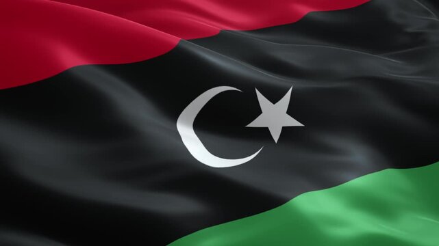 Waving national flag of libya, featuring horizontal stripes of red, black, and green, with a prominent white crescent and star in the center of the black band. detailed fabric texture and dynamic moti
