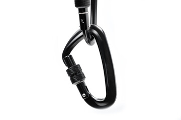 A close-up of a black climbing carabiner, a connector used for climbing ropes