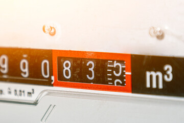 External natural gas meter in the house, gas heating.