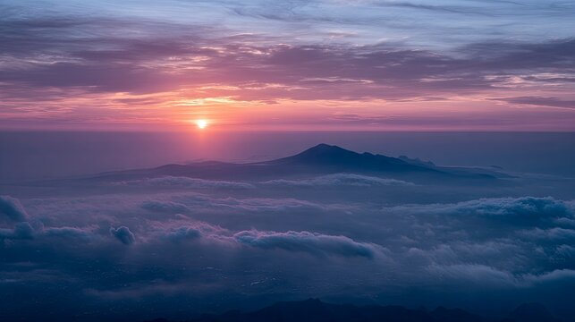 Stunning sunrise paints the mountains with vibrant colors, creating a serene and inspiring landscape, perfect for travel and adventure themes