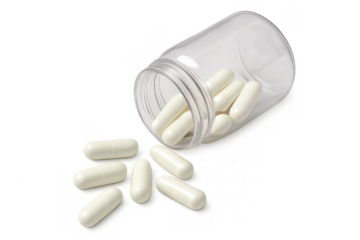 White capsules spilling from a clear bottle, representing medicine, pharmacy, healthcare, and nutritional supplements