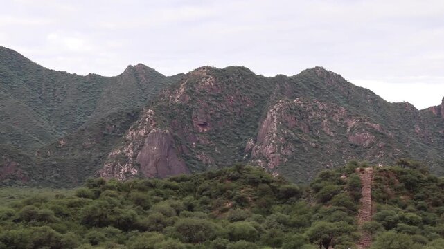 Wide view of the historic Inca ceremonial stone stairway ascending the mountain at El Shincal de Quimivil archeological site in Catamarca Argentina Capital of Qollasuyu