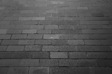 Perspective concrete grey gray silver block pavement. City sidewalk block or the pattern of stone block paving. Empty floor in perspective view