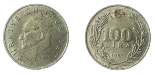 Turkey 100 lira coin on a white isolated background