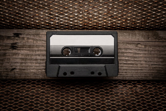 Dark Music Cassette on Industrial Texture.
