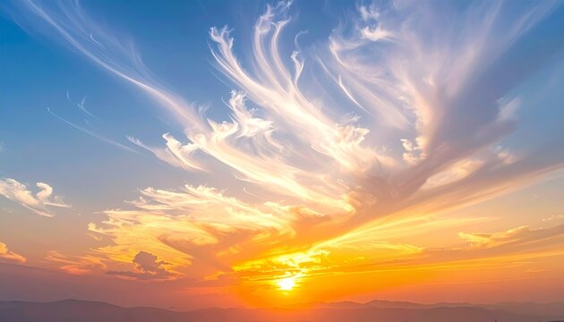 Vibrant sunset sky with dramatic clouds and golden light.