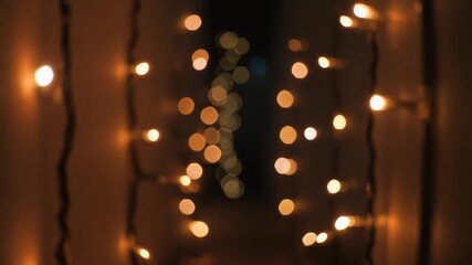 Warm glowing fairy lights twinkle invitingly, creating a magical and festive ambience for holidays or special occasions - Powered by Adobe