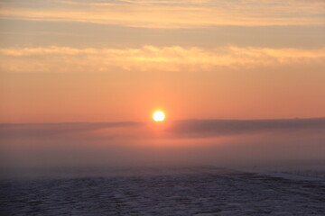 Crisp and Cold Sunrise in the Fog Covered Valley.