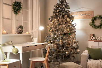 Interior of festive living room with grey sofa, Christmas tree and glowing lamps at evening