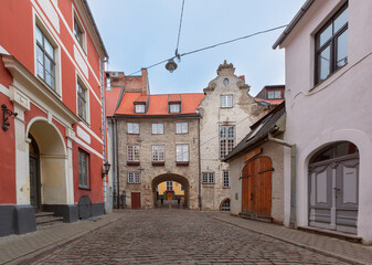 Historic Swedish Gate on cobblestone street in Old Town Riga, Latvia