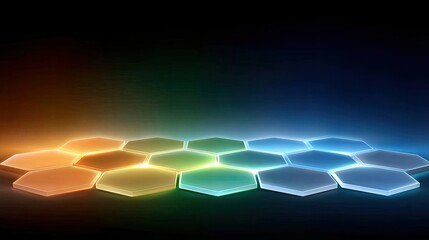 A glowing hexagon grid is illuminated with vibrant colors against a dark background, creating a futuristic and abstract visual.