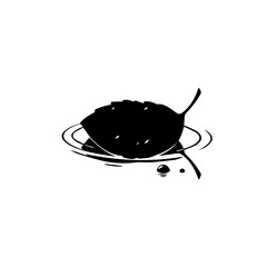 Black silhouette of a leaf floating on water with ripples.