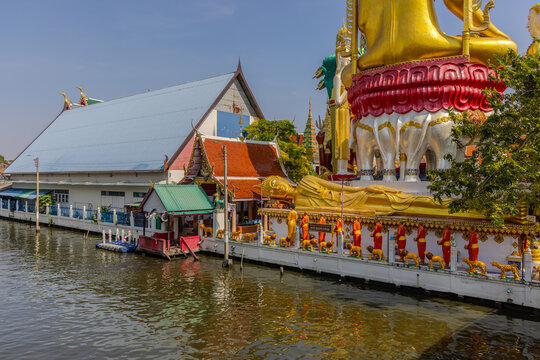 27 November 2025 View of Temple Wat Paknam Phase Charoen with Large Golden statue of Buddha and sleeping Buddha on Klhong Dan a Canal river system in BKK Bangkok Thailand