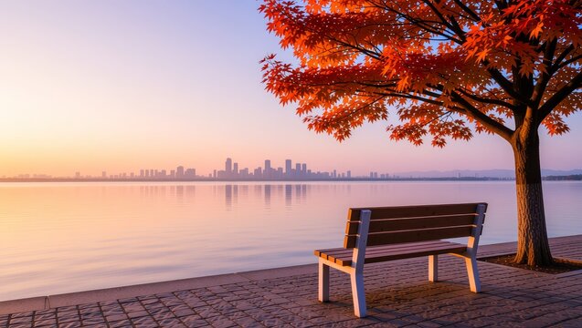 Autumn bench by lake with city skyline at sunset - Powered by Adobe