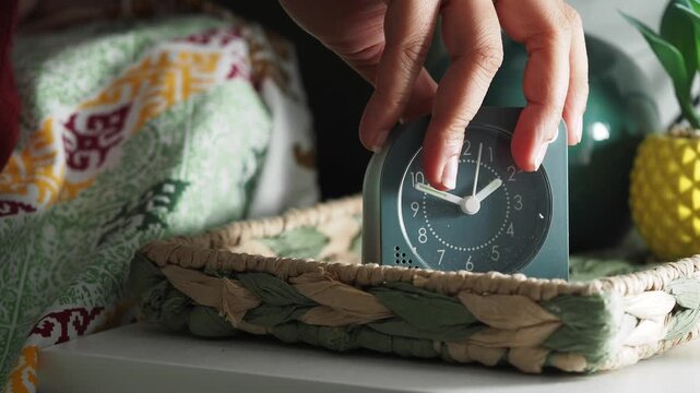 Alarm clock on a bedside table
