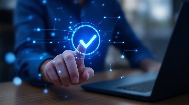 Person touching a digital checkmark icon with a laptop in the background in a blue tone color scheme