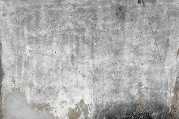 Old weathered cement wall with crack