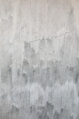 Old weathered cement wall with crack